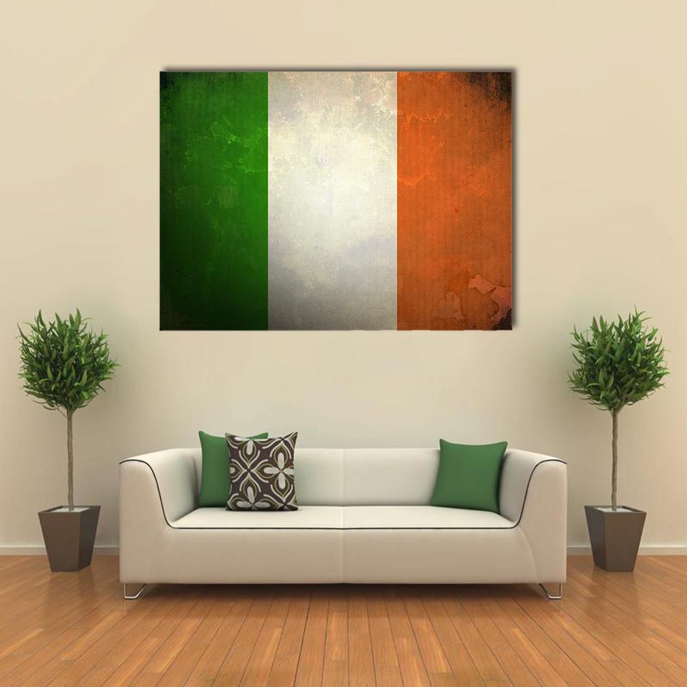 Grunge Irish Flag Canvas Wall Art in white, orange and green, single panel hung on a wall
