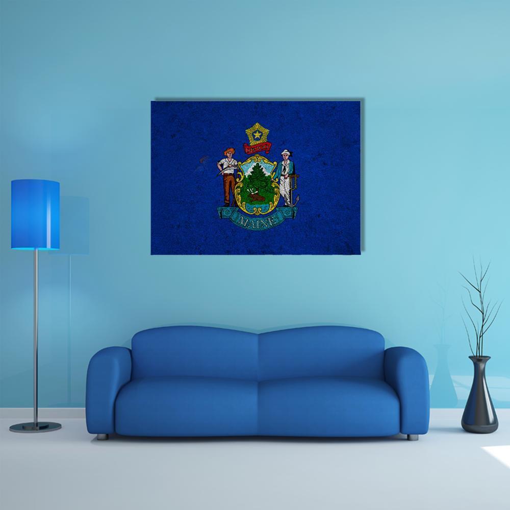 Grunge Maine Flag Canvas Wall Art in blue, single panel hung on a wall