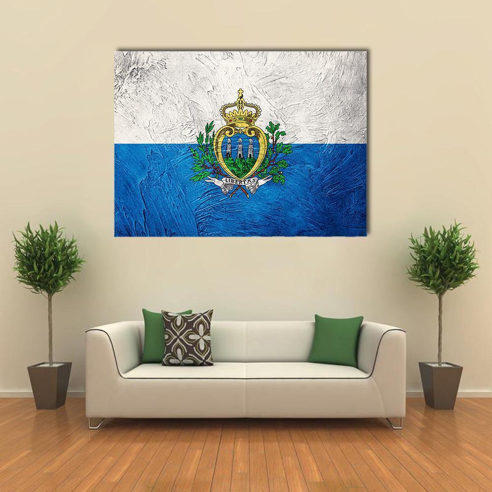 Grunge San Marino Flag Canvas Wall Art in white and blue, single panel hung on a wall