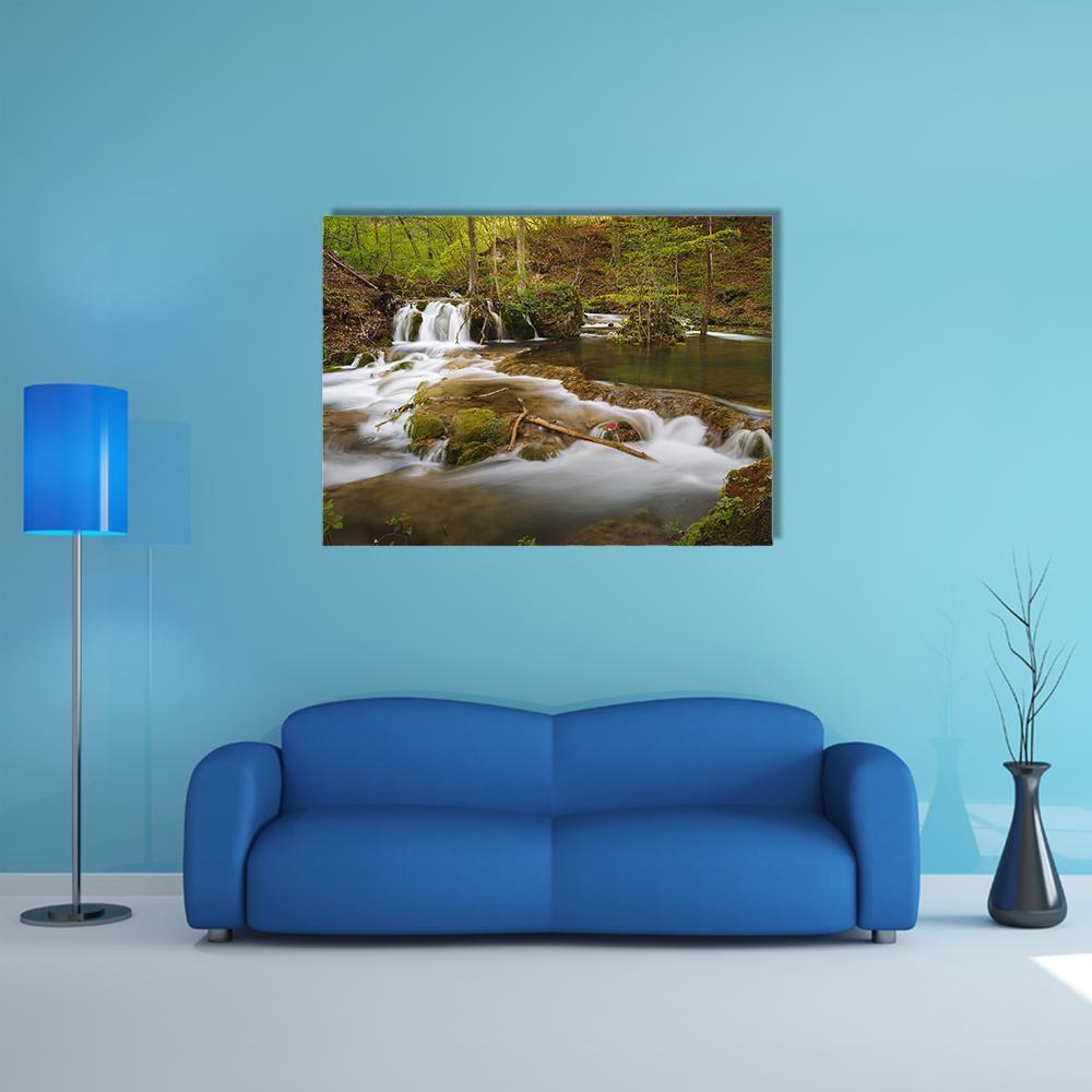 Grza River Waterfall, Serbia Canvas Wall Art in white, brown and green, single panel hung on a wall