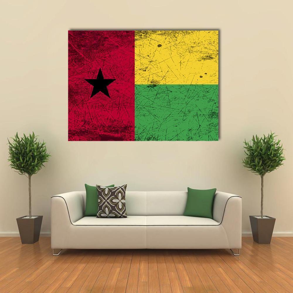 Guinea-bissau Flag Canvas Wall Art in red, yellow and green, single panel hung on a wall