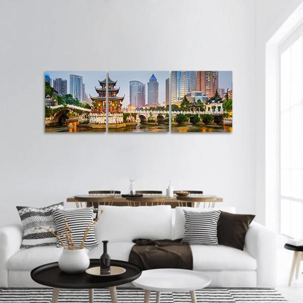 Guiyang City Skyline at Dusk Panoramic Canvas Wall Art in gray, yellow and blue, hung on a wall
