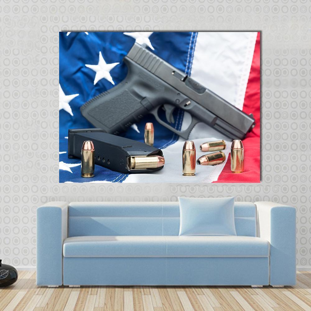 Gun &amp; Bullets on American Flag Canvas Wall Art in black, red and blue, single panel hung on a wall