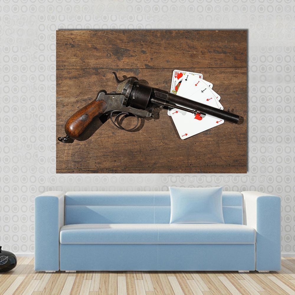 Gun and Cards on Table Canvas Wall Art in black, white and brown, single panel hung on a wall