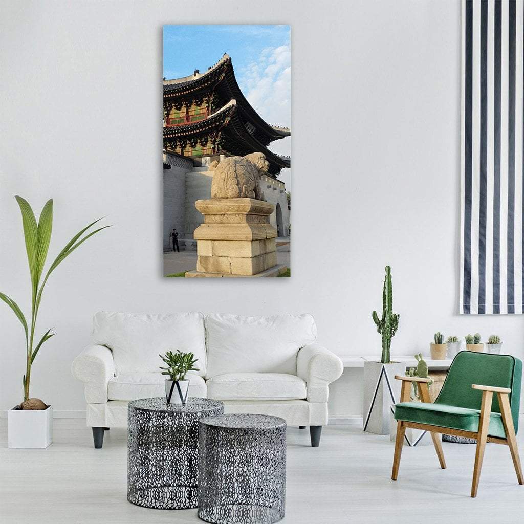 Gyeongbok Palace Gate, Seoul Vertical Canvas Wall Art in gray, beige and blue, single vertical panel hung on a wall