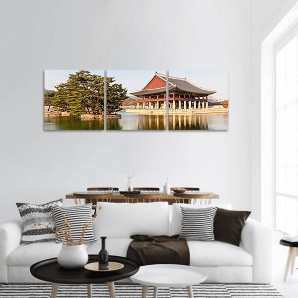 Gyeongbokgung Lakeside Pavilion Panoramic Canvas Wall Art in beige, brown and green, hung on a wall