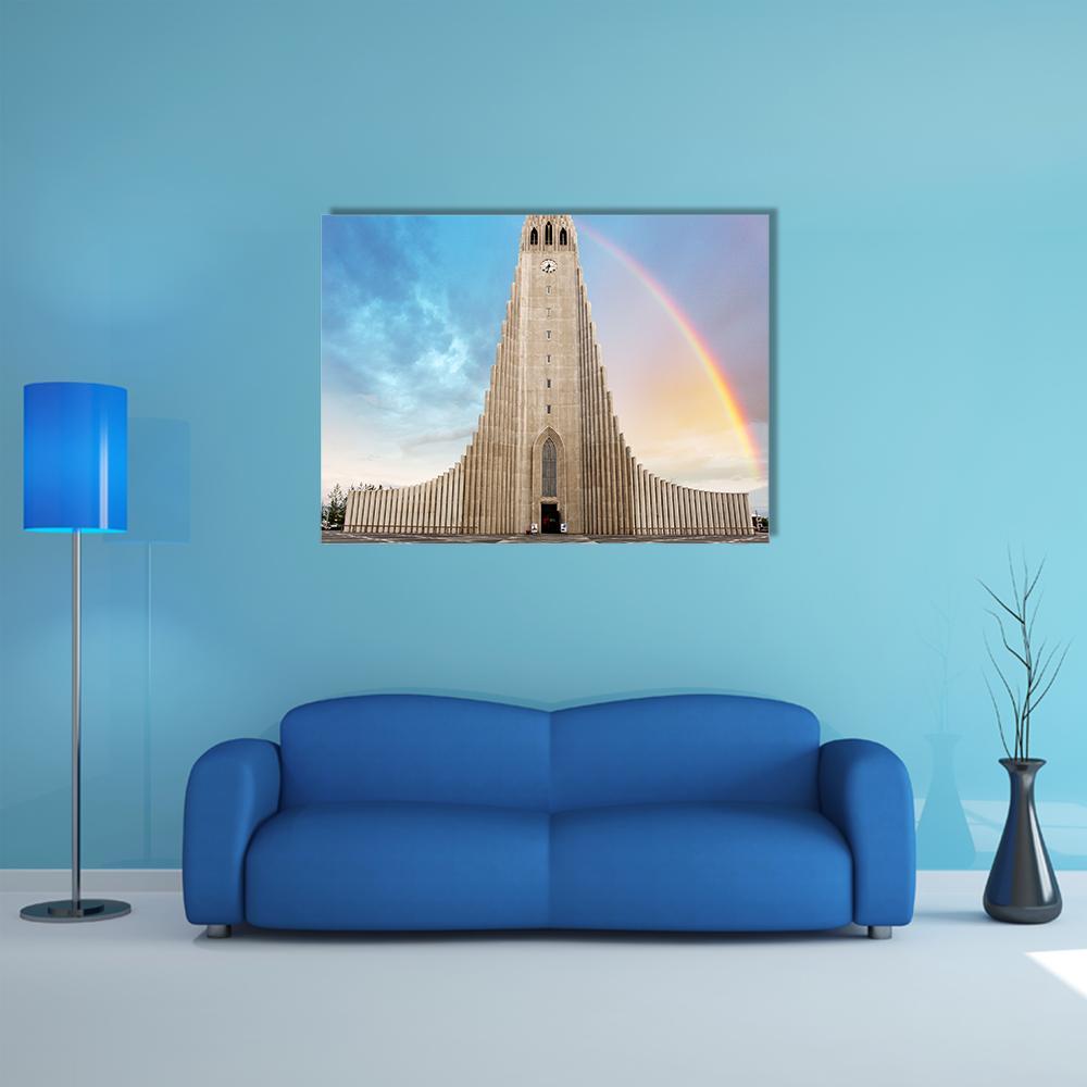 Hallgrímskirkja Cathedral with Rainbow Canvas Wall Art in gray, beige and blue, single panel hung on a wall