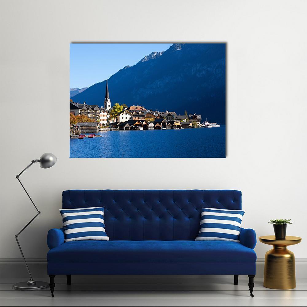 Hallstatt Village by the Lake Canvas Wall Art in white, brown and blue, single panel hung on a wall