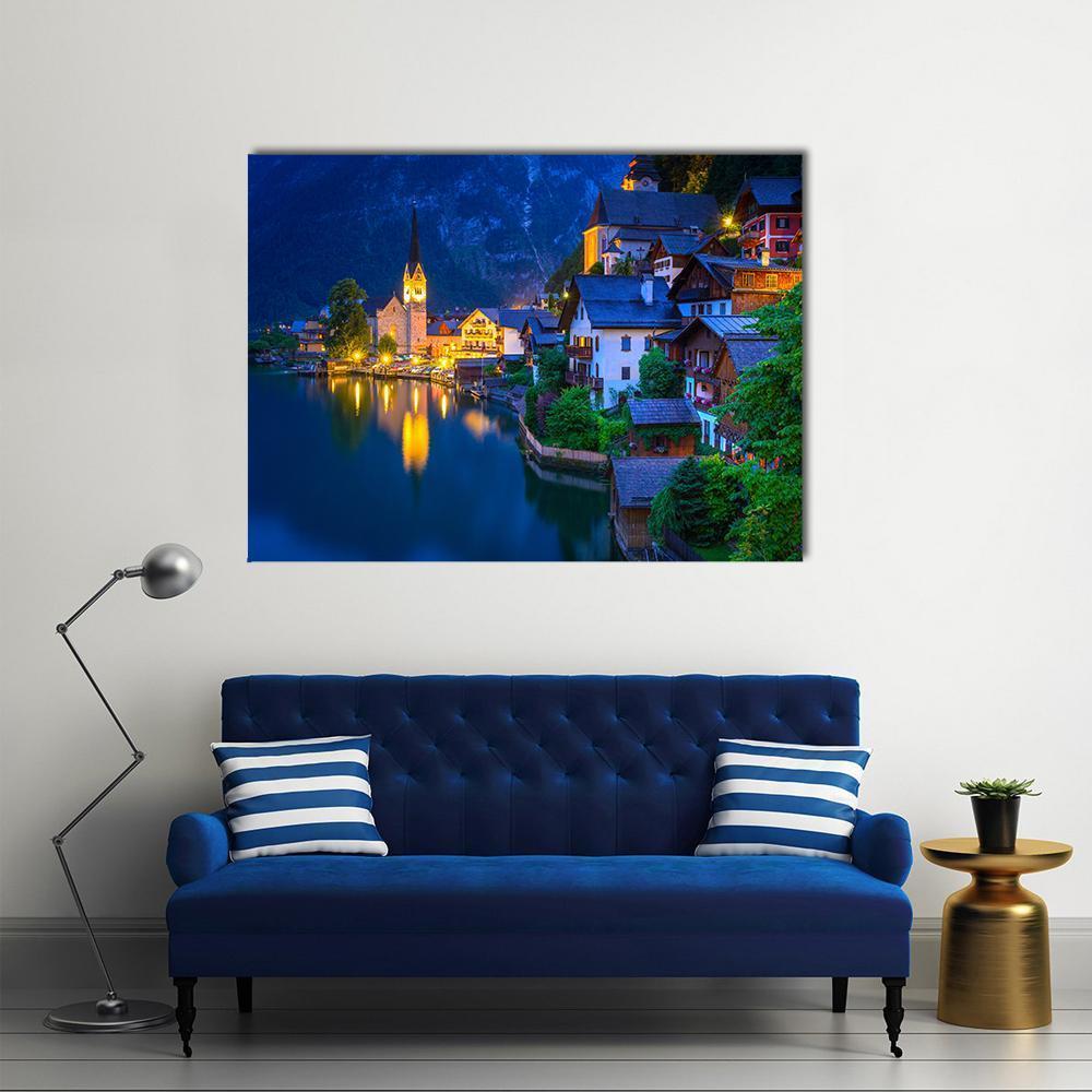Hallstatt Village Illuminated at Dusk Canvas Wall Art in black, yellow and blue, single panel hung on a wall