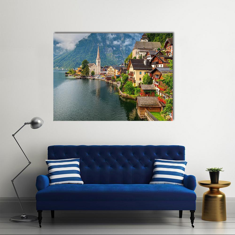 Hallstatt Village by Serene Lake Canvas Wall Art in brown, green and blue, single panel hung on a wall