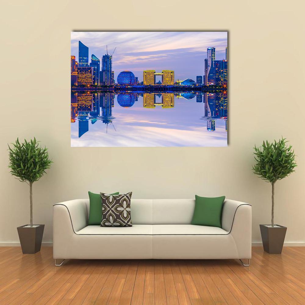 Hangzhou Skyline at Night Canvas Wall Art in gold, blue and purple, single panel hung on a wall