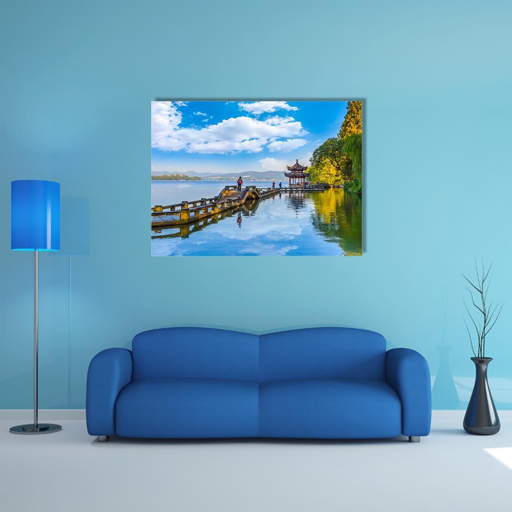 Hangzhou West Lake Pagoda and Stone Bridge Canvas Wall Art in white, green and blue, single panel hung on a wall