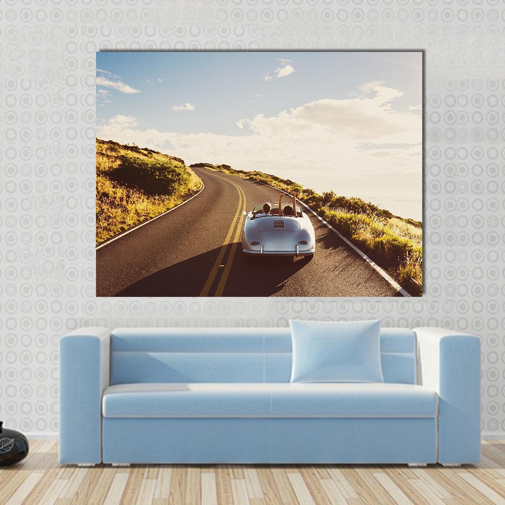 Happy Couple Driving Canvas Wall Art in gray, yellow and blue, single panel hung on a wall