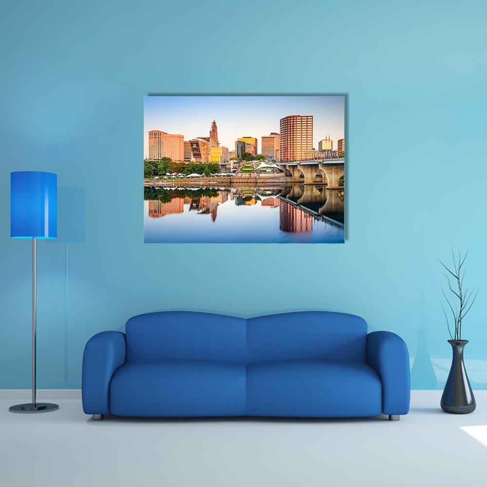 Hartford City Skyline Canvas Wall Art in brown, orange and blue, single panel hung on a wall