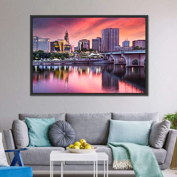 Hartford Connecticut Sunset Skyline Canvas Wall Art in orange, purple and pink, framed canvas, product view on a white background