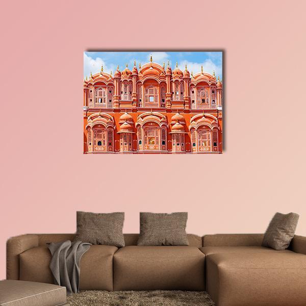 Hawa Mahal Palace Canvas Wall Art in orange, blue and pink, single panel hung on a wall