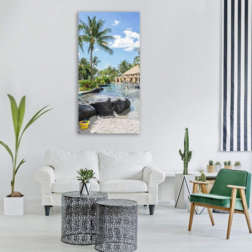 Thatched Cabana at Tropical Resort Pool Vertical Canvas Wall Art in white, green and blue, single vertical panel hung on a wall