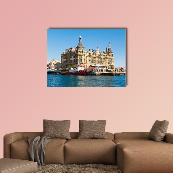 Haydarpasa Train Station Canvas Wall Art in beige, brown and blue, single panel hung on a wall