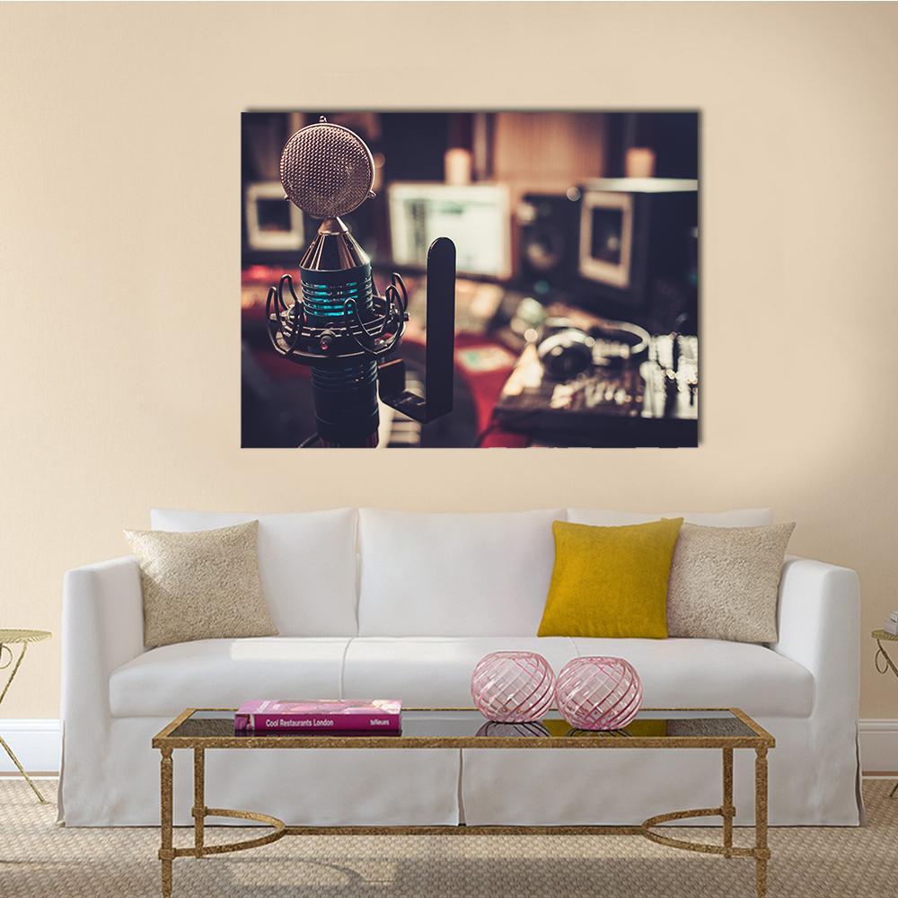 Studio Microphone with Cyan Glow Canvas Wall Art in black, brown and blue, single panel hung on a wall