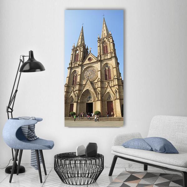 Sacred Heart Cathedral Guangzhou Vertical Canvas Wall Art in beige, brown and blue, single vertical panel hung on a wall