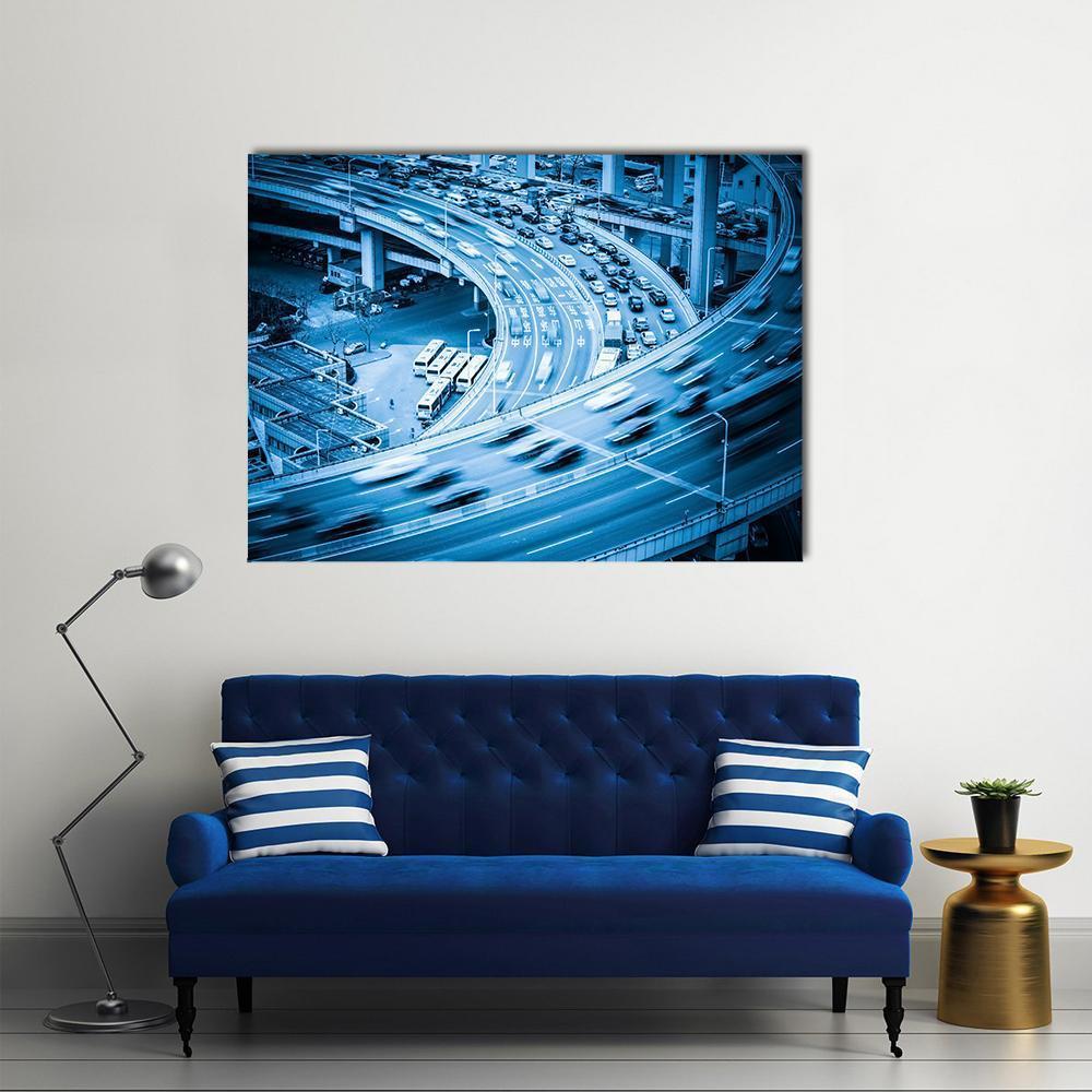 Busy Highway Interchange Close-up Canvas Wall Art in black, white and blue, single panel hung on a wall
