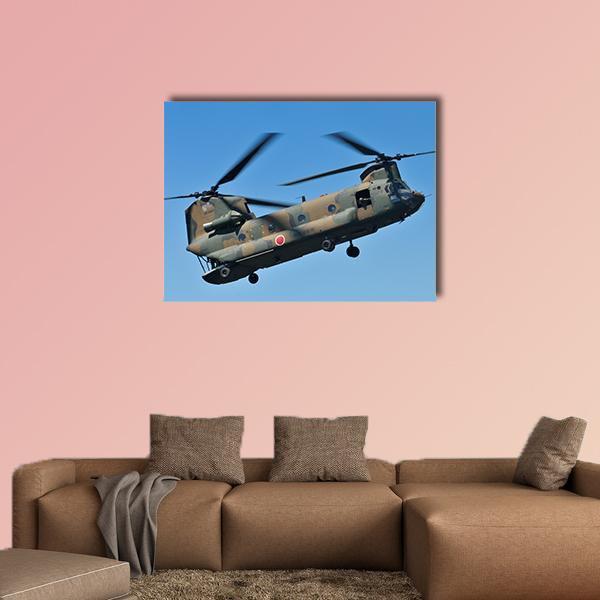 Chinook Helicopter in Flight Canvas Wall Art in brown, green and blue, single panel hung on a wall