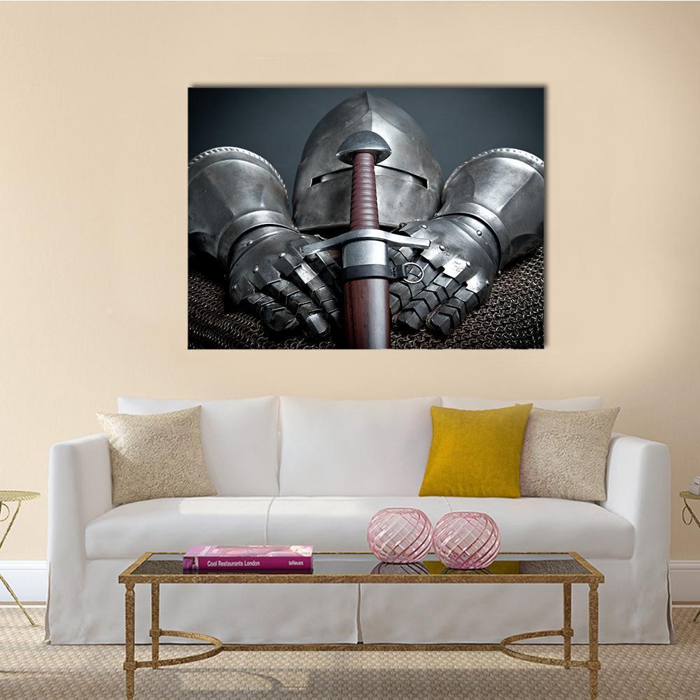 Knight Helmet, Gauntlets and Sword Canvas Wall Art in black, gray and silver, single panel hung on a wall