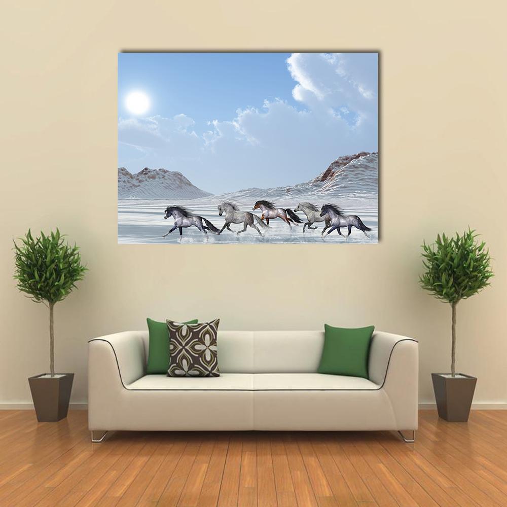 Five Wild Horses Running Through Snow Canvas Wall Art in white, gray and blue, single panel hung on a wall
