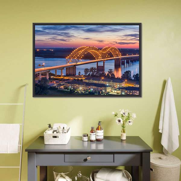 Hernando De Soto Bridge at Sunset Canvas Wall Art in orange, blue and purple, framed canvas, product view on a white background