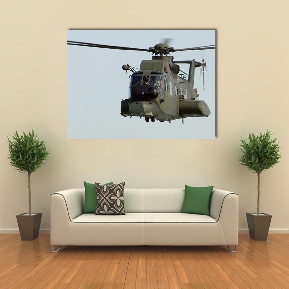 Olive Green Military Helicopter Canvas Wall Art in white, gray and green, single panel hung on a wall