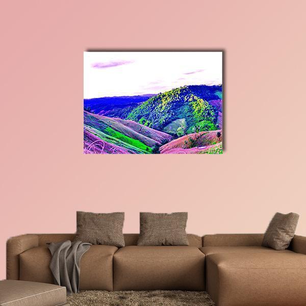 Dreamlike Swirling Hills, Mountains and Forest Canvas Wall Art in green, blue and purple, single panel hung on a wall