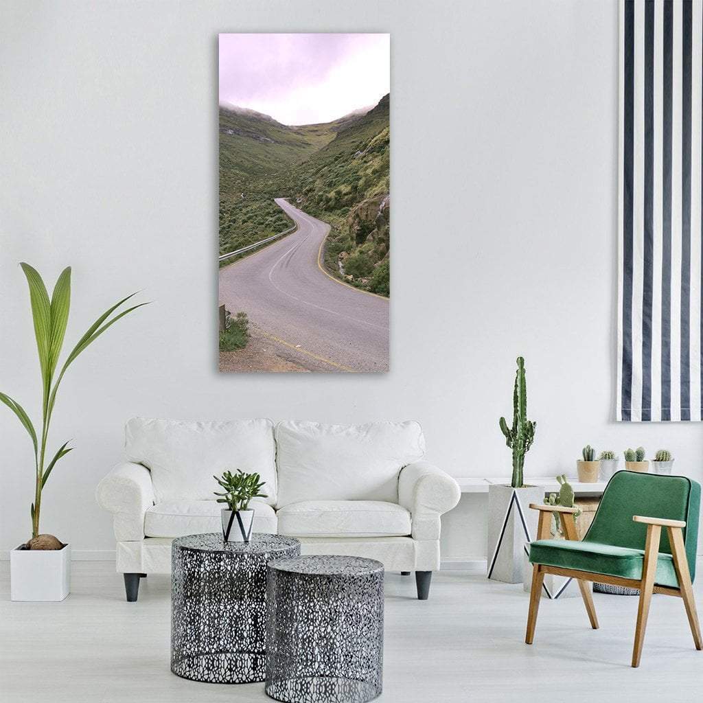 Winding Mountain Highway in Lesotho Vertical Canvas Wall Art in white, gray and green, single vertical panel hung on a wall