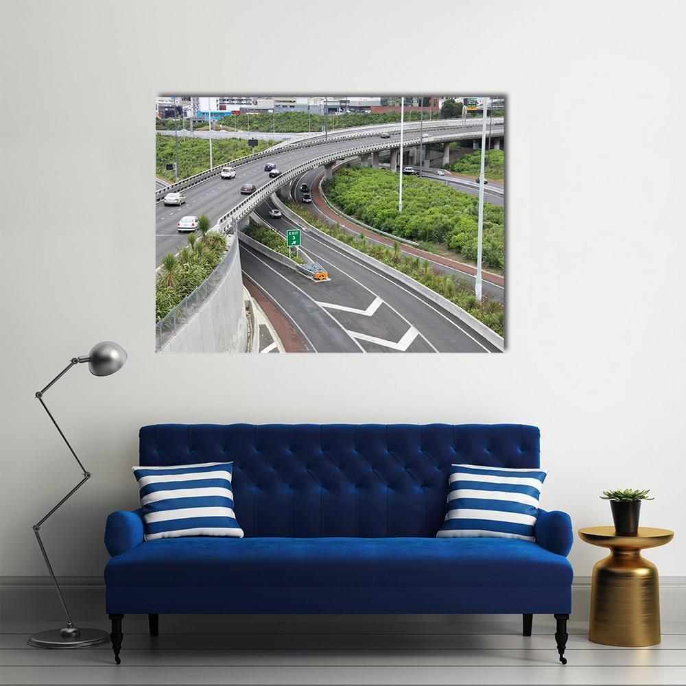 Highways in Busy Auckland Canvas Wall Art in white, gray and green, single panel hung on a wall
