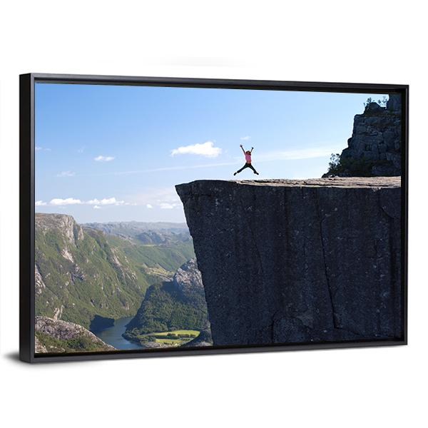 Hiker Jumping On Preikestolen Canvas Wall Art-3 Horizontal-Gallery Wrap-25" x 16"-Tiaracle
