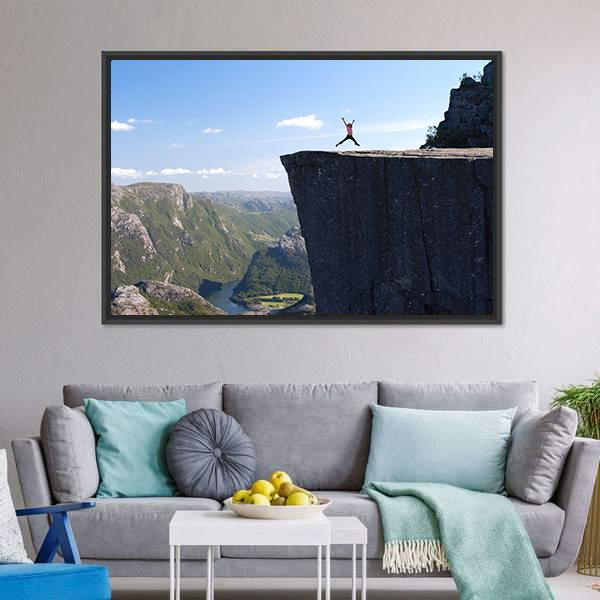 Hiker Jumping On Preikestolen Canvas Wall Art-3 Horizontal-Gallery Wrap-25" x 16"-Tiaracle