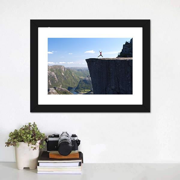 Hiker Jumping On Preikestolen Canvas Wall Art-1 Piece-Framed Print-20" x 16"-Tiaracle