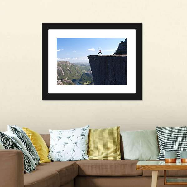 Hiker Jumping On Preikestolen Canvas Wall Art-3 Horizontal-Gallery Wrap-25" x 16"-Tiaracle
