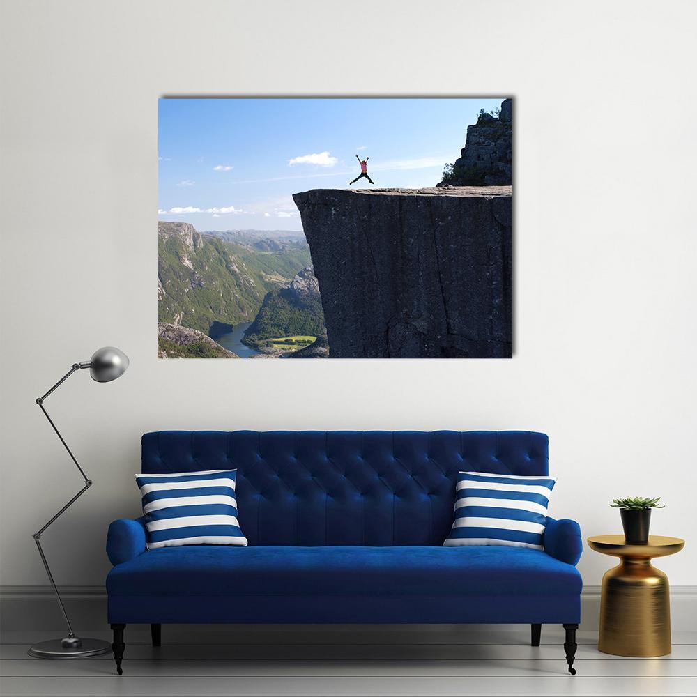 Hiker Jumping On Preikestolen Canvas Wall Art-1 Piece-Gallery Wrap-48" x 32"-Tiaracle