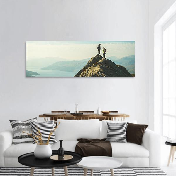 Hikers On Top Of The Mountain Panoramic Canvas Wall Art-1 Piece-36" x 12"-Tiaracle
