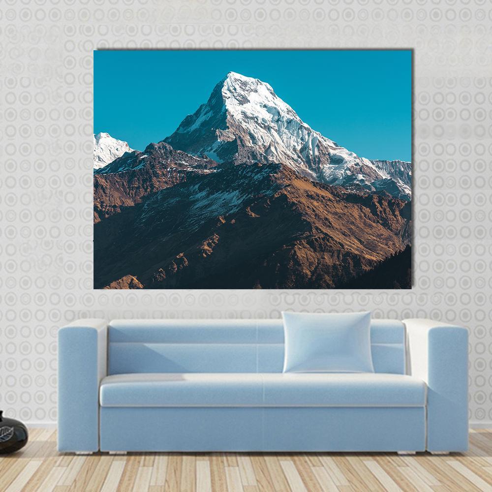 Himalaya Mountains Nepal Canvas Wall Art in white, brown and blue, single panel hung on a wall