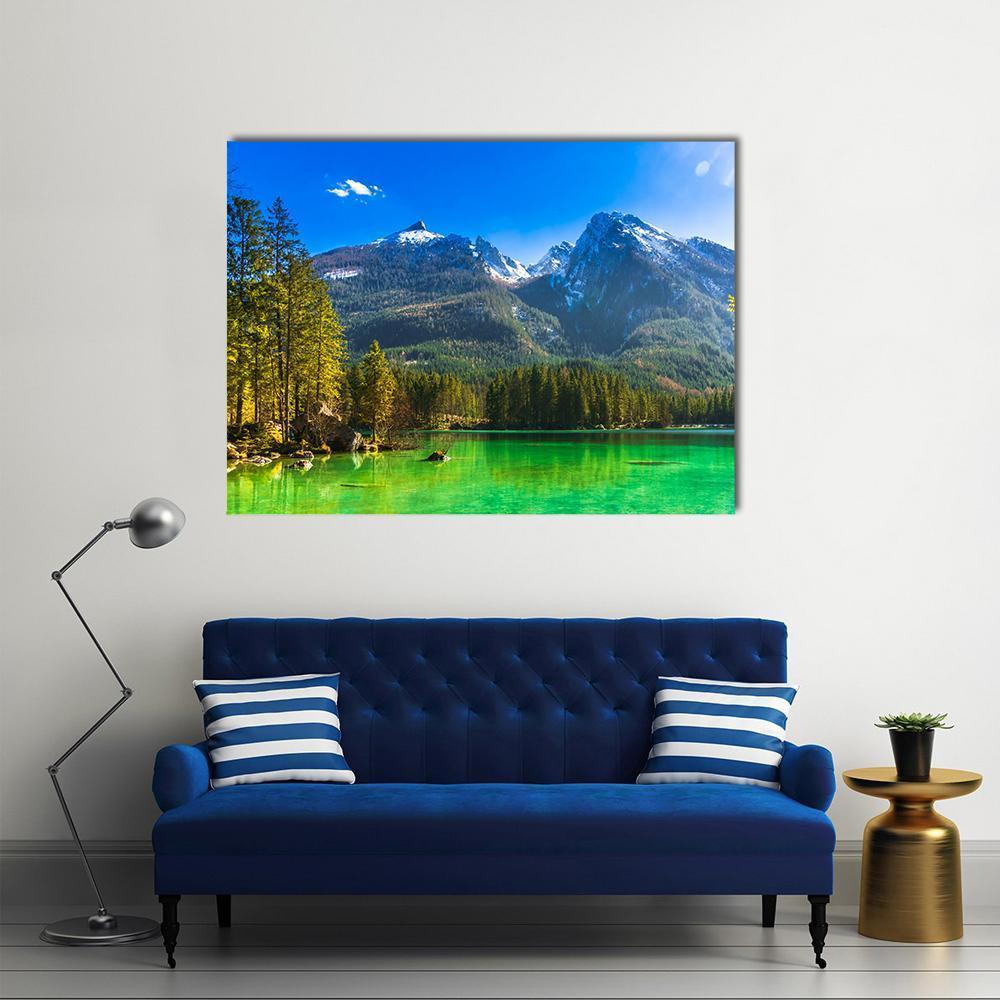 Hintersee Lake with Snow-capped Mountains Canvas Wall Art in white, green and blue, single panel hung on a wall