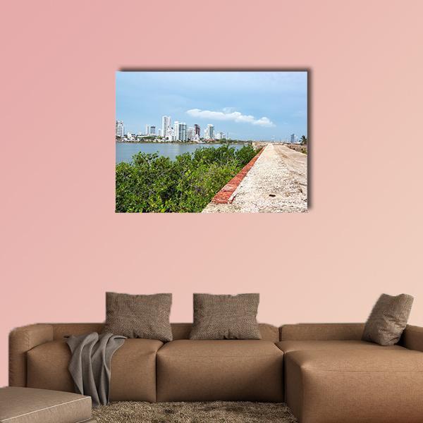 Defensive of Cartagena by the Waterfront Canvas Wall Art in white, green and blue, single panel hung on a wall