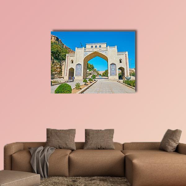 Quran Gate Archway with Blue Tilework Canvas Wall Art in beige, brown and blue, single panel hung on a wall