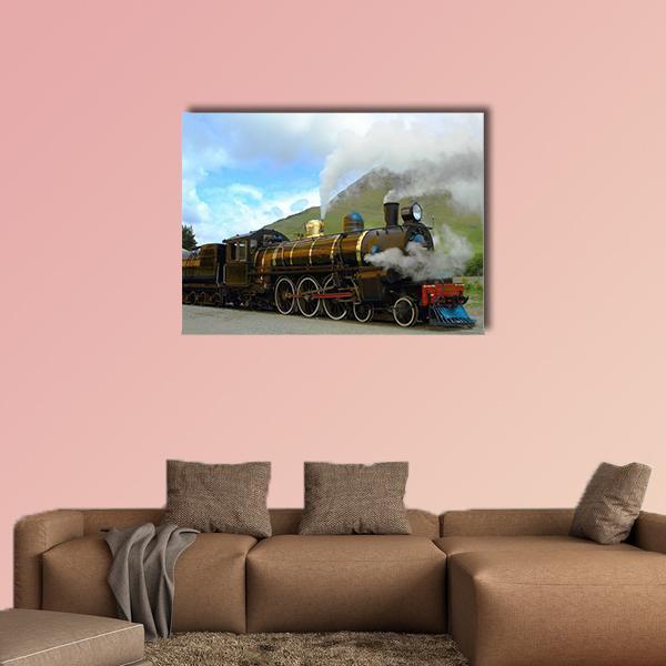 Historic Steam Locomotive in Motion Canvas Wall Art in black, brown and blue, single panel hung on a wall