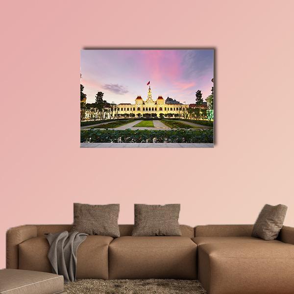 Ho Chi Minh City Hall Canvas Wall Art in yellow, purple and pink, single panel hung on a wall