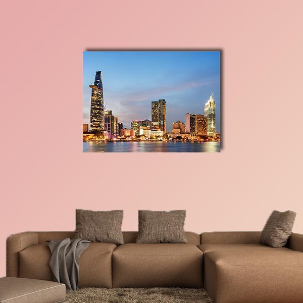 Ho Chi Minh City Skyline Canvas Wall Art in orange, yellow and blue, single panel hung on a wall