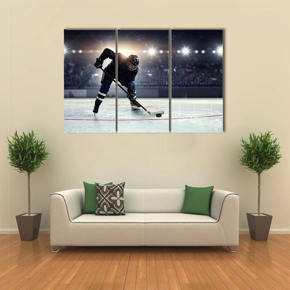 Hockey Player in Blue Uniform On Ice Rink Canvas Wall Art-3 Horizontal-Gallery Wrap-37" x 24"-Tiaracle