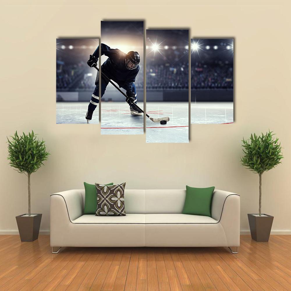 Hockey Player in Blue Uniform On Ice Rink Canvas Wall Art-4 Pop-Gallery Wrap-50" x 32"-Tiaracle