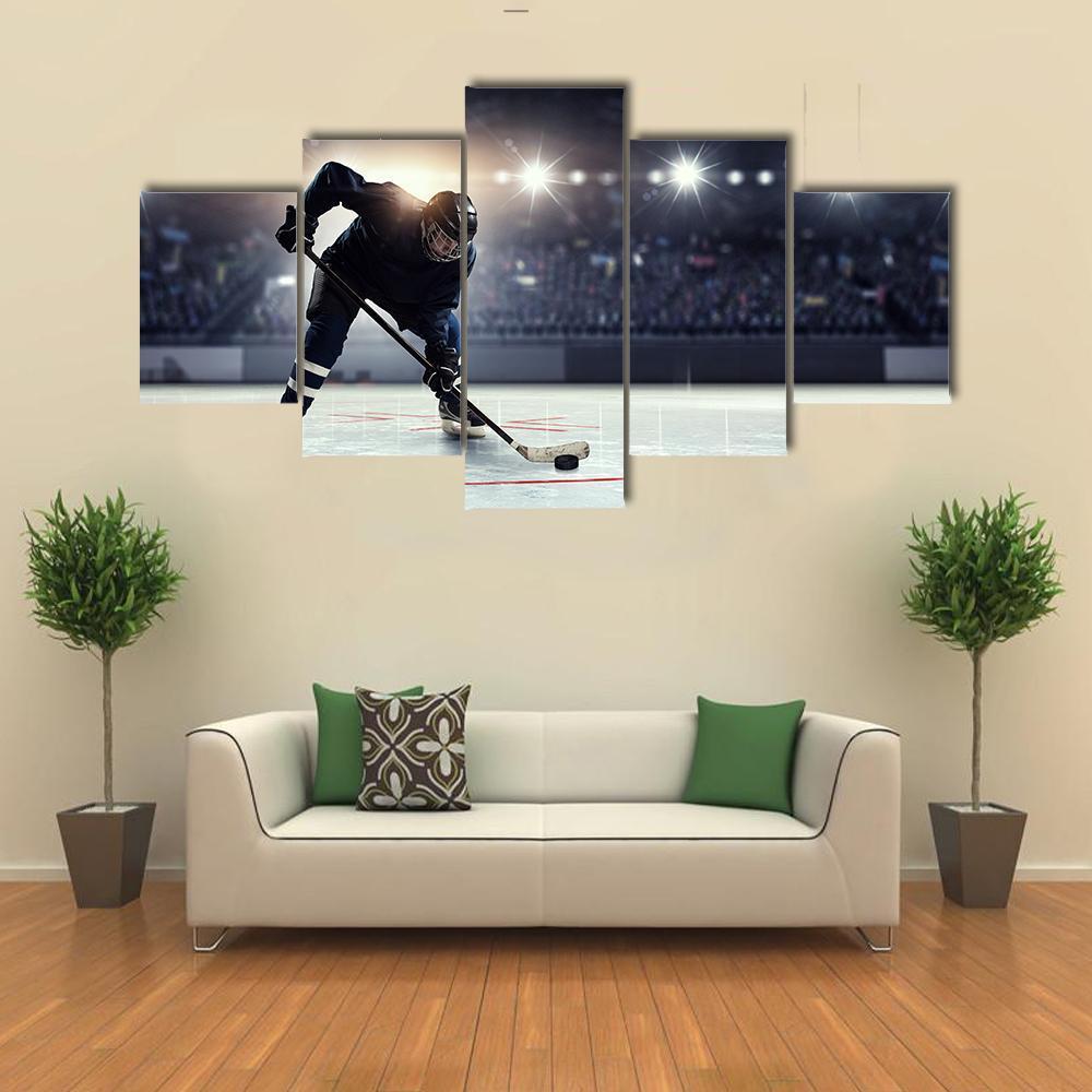 Hockey Player in Blue Uniform On Ice Rink Canvas Wall Art-5 Star-Gallery Wrap-62&quot; x 32&quot;-Tiaracle
