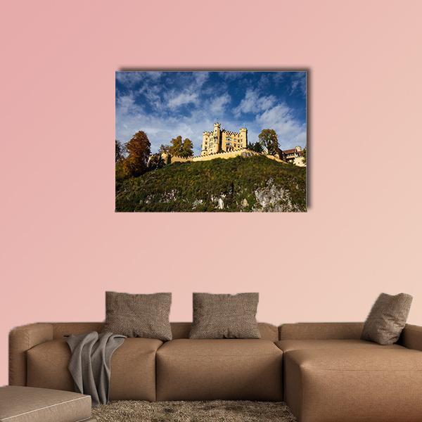Hohenschwangau Castle in Autumn Canvas Wall Art in yellow, green and blue, single panel hung on a wall